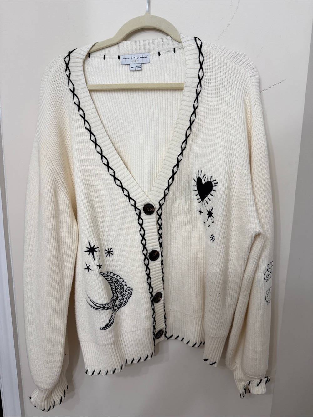 Never Fully Dressed Cream Cardigan with Black Embroidered Moon & Heart Motifs